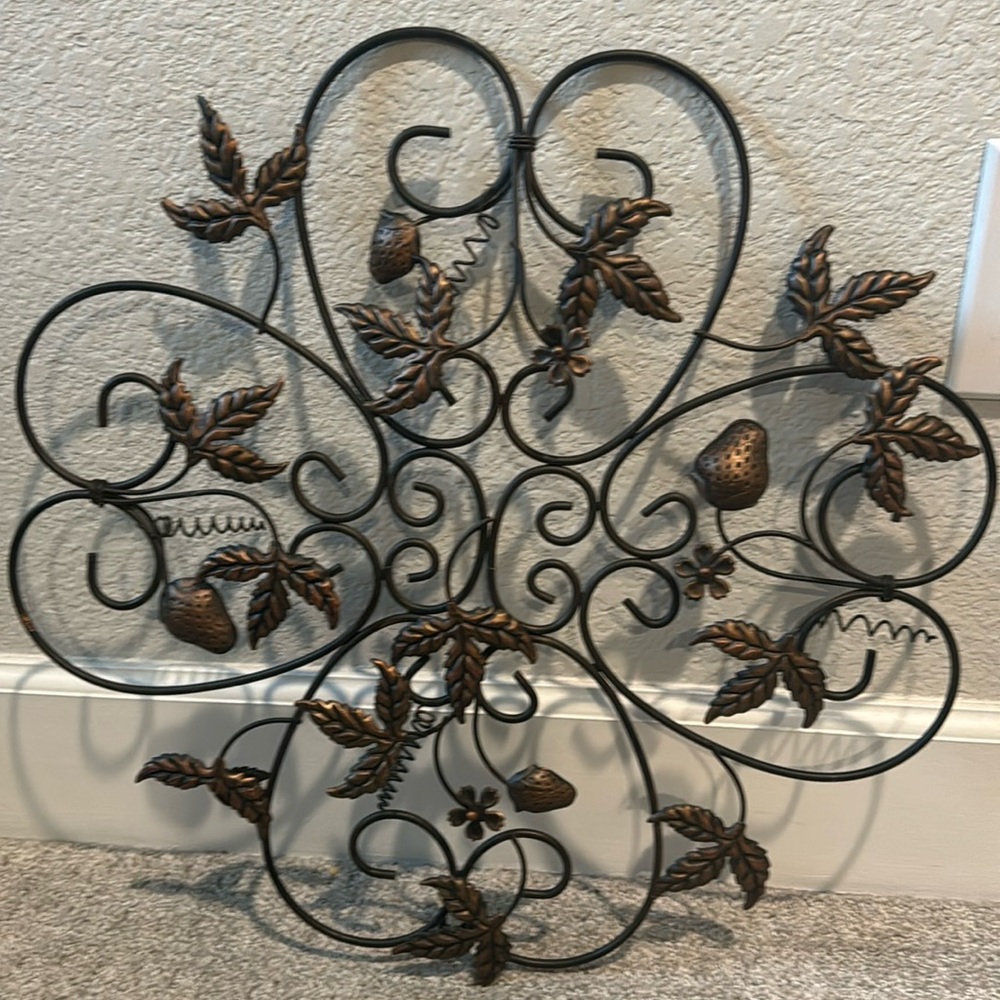 Iron cross with leaf and strawberry accents